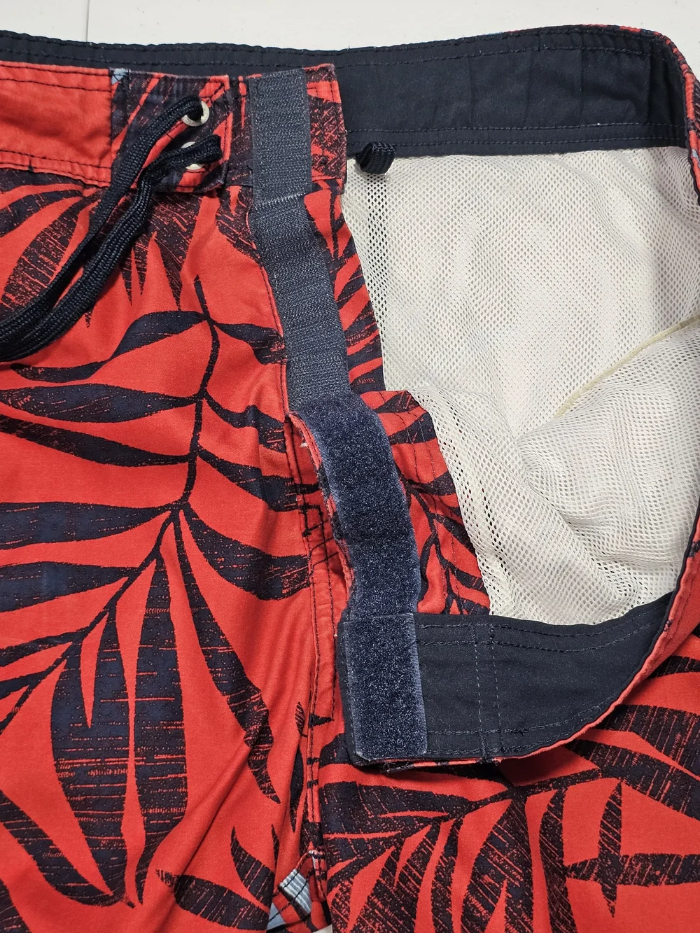 Nautica Red Swim Shorts with Black and Light Blue Tropical Leaf Print Large